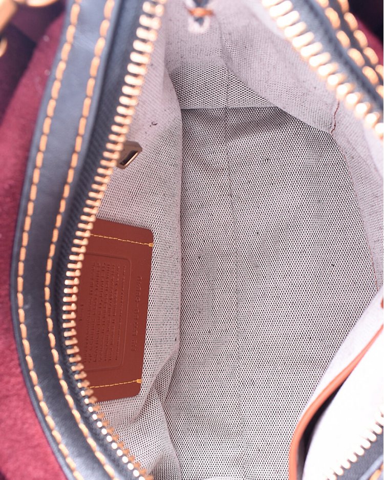 coach tea rose saddle bolsa