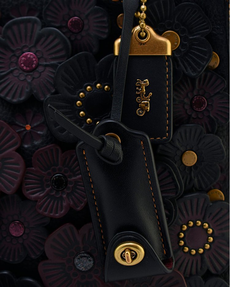 coach tea rose saddle bolsa