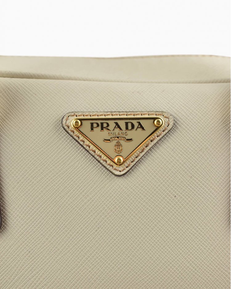 prada bolsa cream