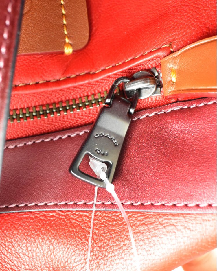 coach bolsa fake vs real